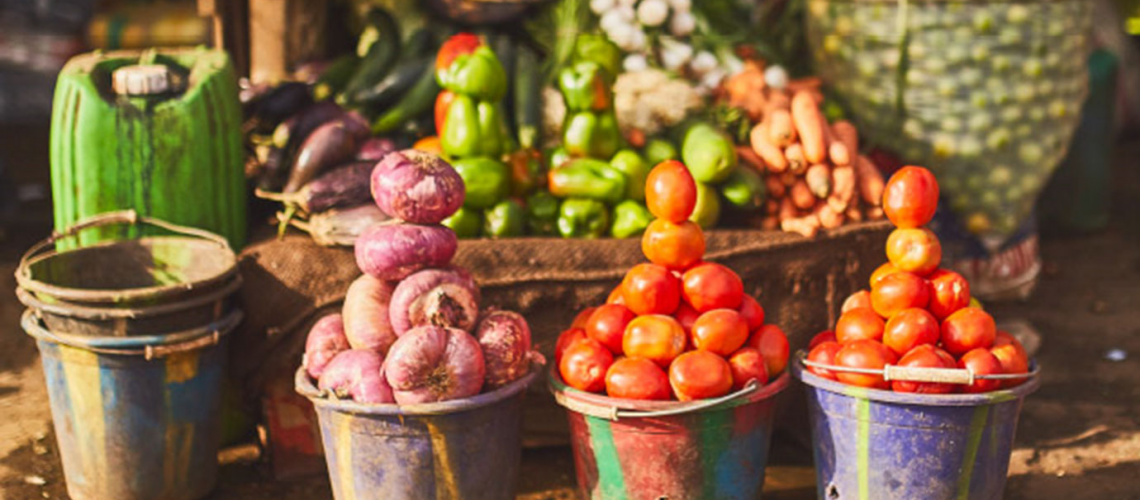 Food piled high in tin buckets