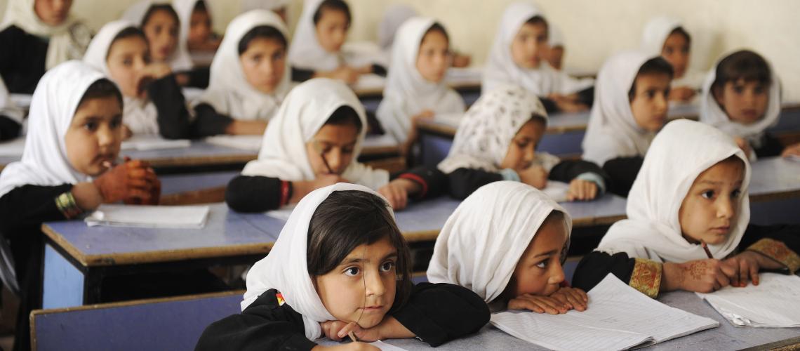 School girls sitting at their desks