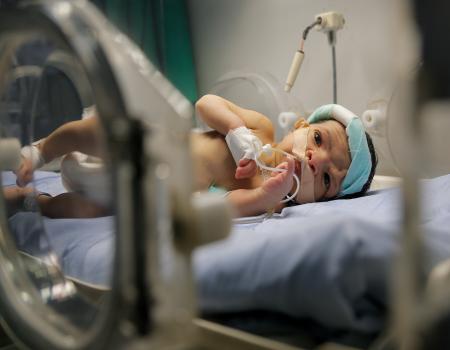 Hospitalised baby hooked up to machines